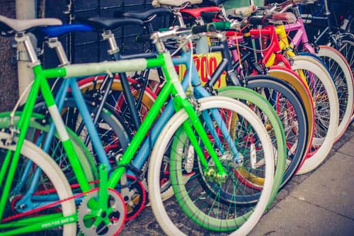 Row of colorful parked bicycles